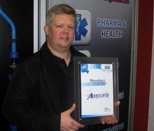 Australis Engineering director Peter Gustafson receives his APPMA membership certificate.